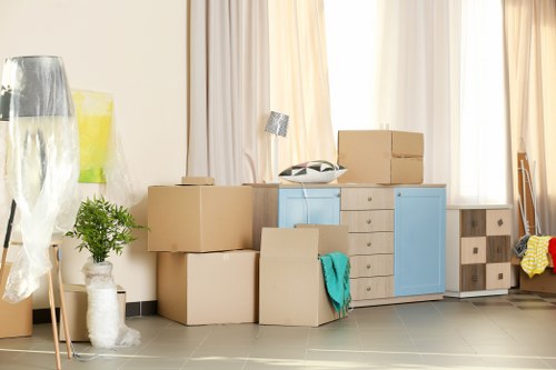 Furniture removals team handling household items in Hendon