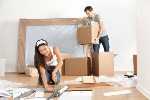 Removal team loading household items for a move in Hendon