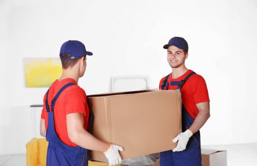 Packed office furniture and equipment ready for transport