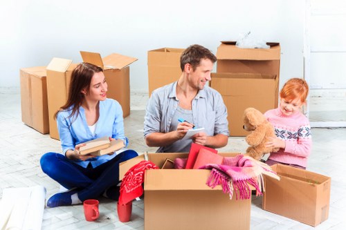 Packed boxes and furniture prepared for a home move in Hendon
