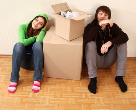 Removal team handling household belongings during a move in Hendon