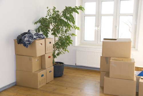 Packed boxes and furniture ready for local house removals